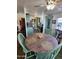 Bright dining area with a round table, four chairs, and built-in hutch at 2233 E Behrend Dr # 93, Phoenix, AZ 85024
