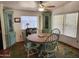 Dining area with wooden table and four chairs at 2233 E Behrend Dr # 93, Phoenix, AZ 85024