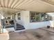 Mobile home with covered patio and landscaping at 2233 E Behrend Dr # 93, Phoenix, AZ 85024