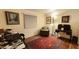 Bright home office with hardwood floors, window coverings, and ample workspace at 2233 E Behrend Dr # 93, Phoenix, AZ 85024