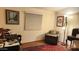 Cozy home office features a comfortable chair, desk, and hardwood floors at 2233 E Behrend Dr # 93, Phoenix, AZ 85024