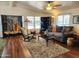 Living room with hardwood floors and cozy furniture at 2233 E Behrend Dr # 93, Phoenix, AZ 85024