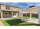 Backyard with artificial turf, a gazebo, and a view of the house's back at 224 S 151St Ave, Goodyear, AZ 85338