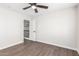 Spacious bedroom with wood-look floors and access to upper loft at 224 S 151St Ave, Goodyear, AZ 85338
