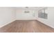 Bright dining room with hardwood floors and a modern chandelier at 224 S 151St Ave, Goodyear, AZ 85338