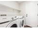 Bright laundry room with Samsung washer and dryer at 224 S 151St Ave, Goodyear, AZ 85338