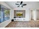 Living area with built-in media console and large windows at 2446 W Myopia Dr, Anthem, AZ 85086