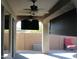 Covered patio with ceiling fan and comfortable seating at 2446 W Myopia Dr, Anthem, AZ 85086