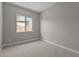 Bedroom with a neutral color scheme, plush carpet, and natural light at 32470 N 134Th Ln, Peoria, AZ 85383