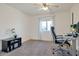 Home office with a large desk, comfortable chair, and window views at 3825 E Camelback Rd # 239, Phoenix, AZ 85018