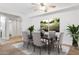 Bright dining room with a large dining table, comfortable seating, and natural light at 3825 E Camelback Rd # 239, Phoenix, AZ 85018