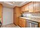Well-equipped kitchen with light wood cabinets and granite countertops at 3825 E Camelback Rd # 239, Phoenix, AZ 85018
