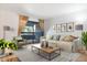 Bright living room with large sliding doors to balcony allowing for plenty of natural light at 3825 E Camelback Rd # 239, Phoenix, AZ 85018