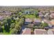 Backyard oasis featuring a pool, mature trees, and green grass at 4188 E Lexington Ave, Gilbert, AZ 85234