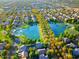 Gorgeous aerial view of the community showcasing lush landscaping, serene lakes, and a park at 4188 E Lexington Ave, Gilbert, AZ 85234