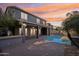 Stunning backyard with a refreshing pool, covered patio, and beautiful sunset views perfect for outdoor entertaining at 4188 E Lexington Ave, Gilbert, AZ 85234