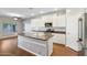Modern kitchen featuring white cabinetry, stainless steel appliances, and a functional island at 4188 E Lexington Ave, Gilbert, AZ 85234