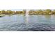 Scenic lake view with a fountain and wildlife at 4188 E Lexington Ave, Gilbert, AZ 85234