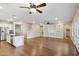 Open concept kitchen with center island and hardwood floors with view of living room at 4188 E Lexington Ave, Gilbert, AZ 85234