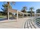 Outdoor seating areas with picnic tables near a walking path at 4188 E Lexington Ave, Gilbert, AZ 85234