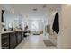 Modern bathroom with double vanity, soaking tub, and walk-in shower at 4507 S 119Th Dr, Avondale, AZ 85323