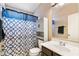 Bathroom with shower/tub combo at 45513 W Sky Ln, Maricopa, AZ 85139