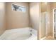 Bathroom with shower and bathtub at 45513 W Sky Ln, Maricopa, AZ 85139