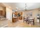 Kitchen with an island, stainless steel appliances, and wood cabinets at 45513 W Sky Ln, Maricopa, AZ 85139