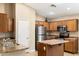 Modern kitchen featuring stainless steel appliances and ample counter space at 45513 W Sky Ln, Maricopa, AZ 85139