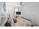 Bedroom with white bed frame, dresser, and flat-screen TV at 4887 N 179Th Dr, Goodyear, AZ 85395