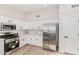 Modern kitchen featuring stainless steel appliances and white cabinetry at 531 W Spur Ave, Gilbert, AZ 85233