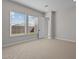 Serene bedroom with plush carpet flooring, light gray walls, and large windows offering abundant natural light at 5525 N 193Rd Dr, Litchfield Park, AZ 85340
