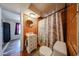 Small bathroom with shower/tub combo and pedestal sink at 5543 W Gardenia Ave, Glendale, AZ 85301