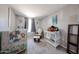Bright Bedroom with crib, changing table, and toys at 5543 W Gardenia Ave, Glendale, AZ 85301