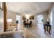 Bright dining area with a table and chairs, and views into other rooms at 5543 W Gardenia Ave, Glendale, AZ 85301