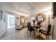 Bright dining area with a table and chairs, and access to other rooms at 5543 W Gardenia Ave, Glendale, AZ 85301