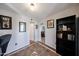 Home office with built-in shelving and arched entryway at 5543 W Gardenia Ave, Glendale, AZ 85301