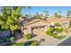 Single-story home with a two-car garage and manicured landscaping at 6202 E Mckellips Rd # 42, Mesa, AZ 85215