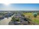 Aerial view of community with homes and golf course at 6202 E Mckellips Rd # 42, Mesa, AZ 85215