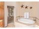 Relaxing bathroom featuring a large soaking tub and shower at 6202 E Mckellips Rd # 42, Mesa, AZ 85215
