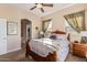Spacious bedroom with wood furniture and neutral decor at 6202 E Mckellips Rd # 42, Mesa, AZ 85215