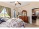 Spacious bedroom with dresser and access to patio at 6202 E Mckellips Rd # 42, Mesa, AZ 85215