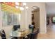 Breakfast nook with hexagonal glass table and four chairs at 6202 E Mckellips Rd # 42, Mesa, AZ 85215
