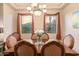 Formal dining room with elegant wood table and chairs at 6202 E Mckellips Rd # 42, Mesa, AZ 85215