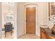 Entryway with wood door and console table at 6202 E Mckellips Rd # 42, Mesa, AZ 85215