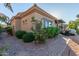 Home exterior showcasing landscaping and patio area at 6202 E Mckellips Rd # 42, Mesa, AZ 85215