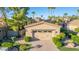 Two-car garage with driveway and landscaping at 6202 E Mckellips Rd # 42, Mesa, AZ 85215