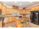 Kitchen with granite countertops and island with seating at 6202 E Mckellips Rd # 42, Mesa, AZ 85215