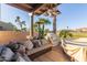 Covered patio with seating area and outdoor heater at 6202 E Mckellips Rd # 42, Mesa, AZ 85215