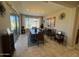 Bright dining room with sliding glass doors, tile flooring, and contemporary decor at 6516 W Madre Del Oro Dr, Phoenix, AZ 85083